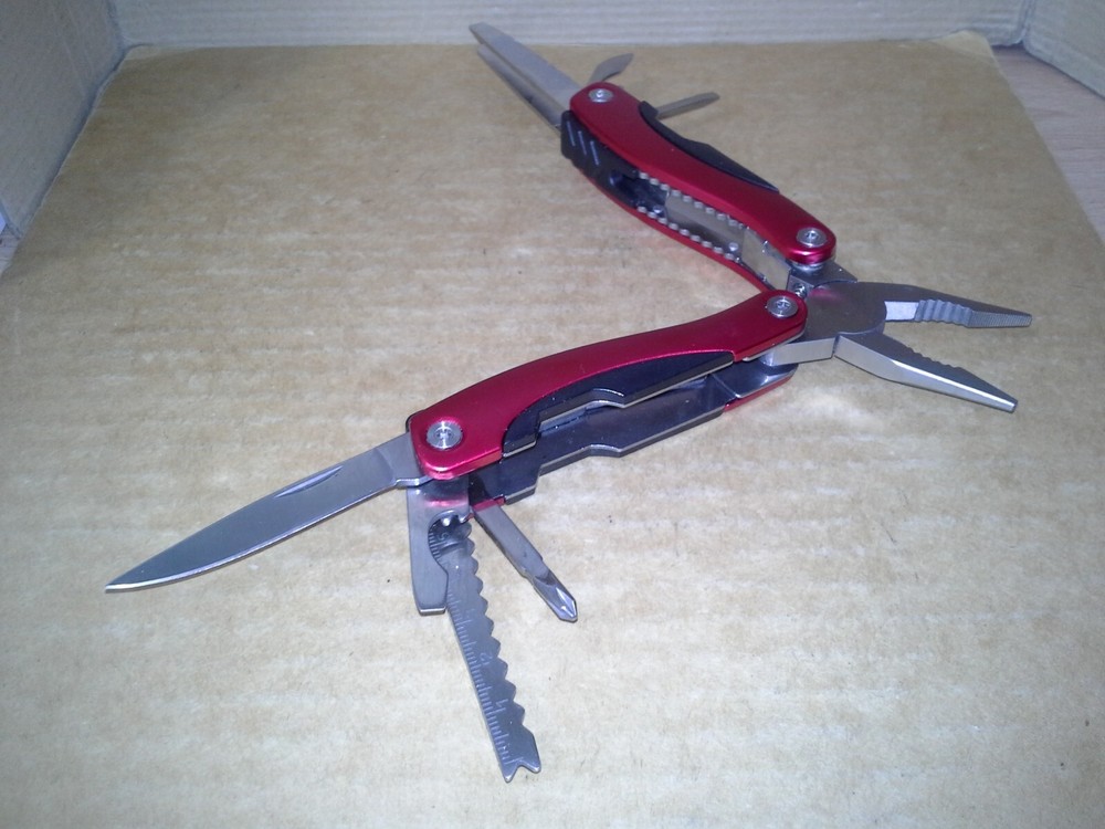 Switzerland Red Multitool Folding Pocket Pliers. VGC