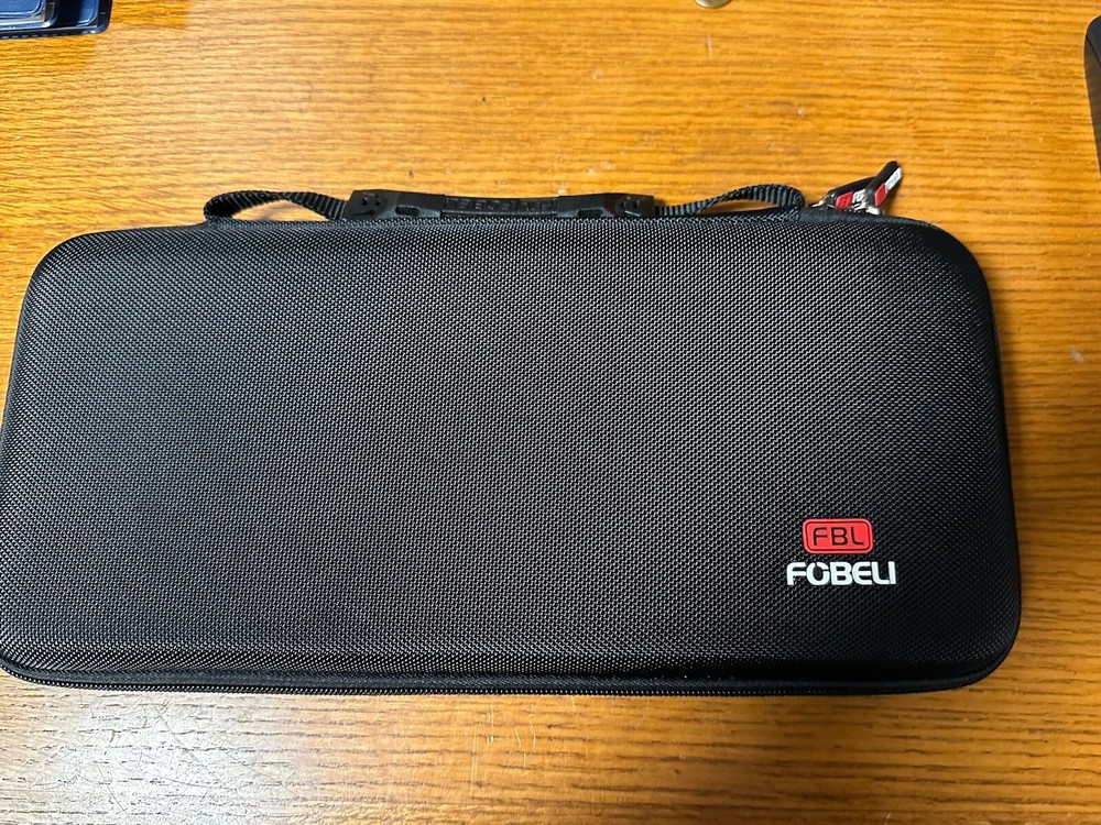 Zipped Carrying Case With Handle and felt Interior.