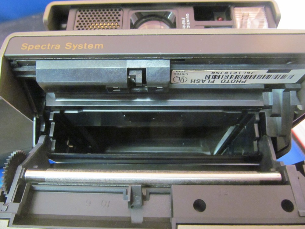 POLAROID SPECTRA SYSTEM CAMERA WITH STRAP CASE & MANUAL UNTESTED