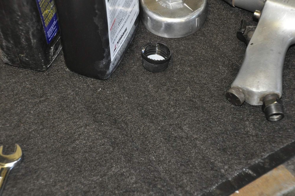 Design Engineering Protective Absorbent Oil Rug