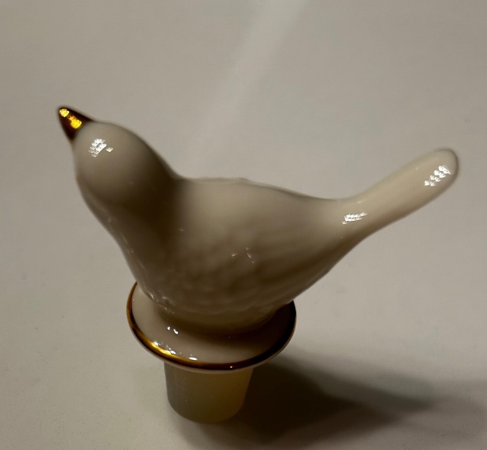 three lenox perfume stoppers