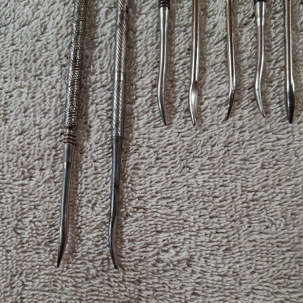 Lot of 2 Spring Loaded Nutcrackers and 10 Picks