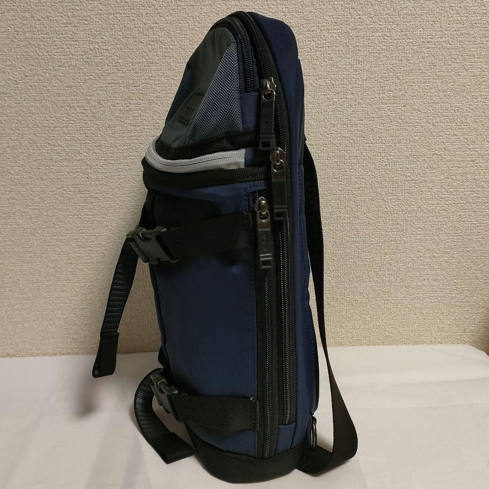 TUMI body bag slingback