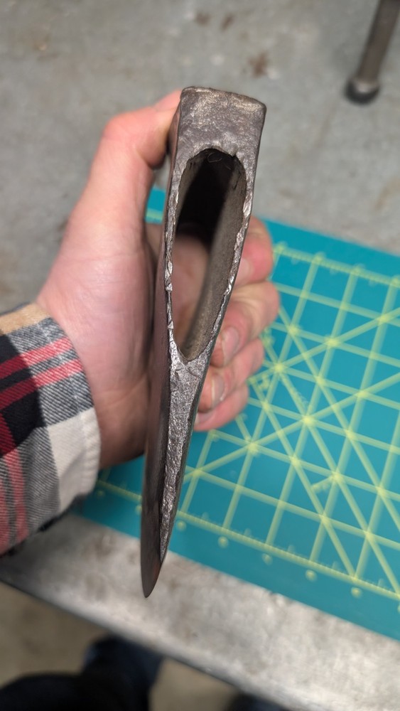 Kelly works axe and tool