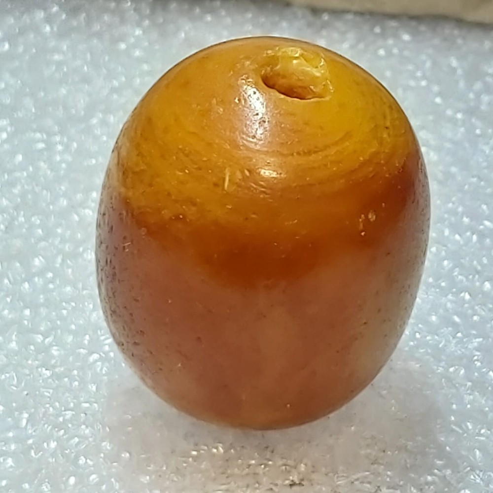 Ancient large amber cabochon bead