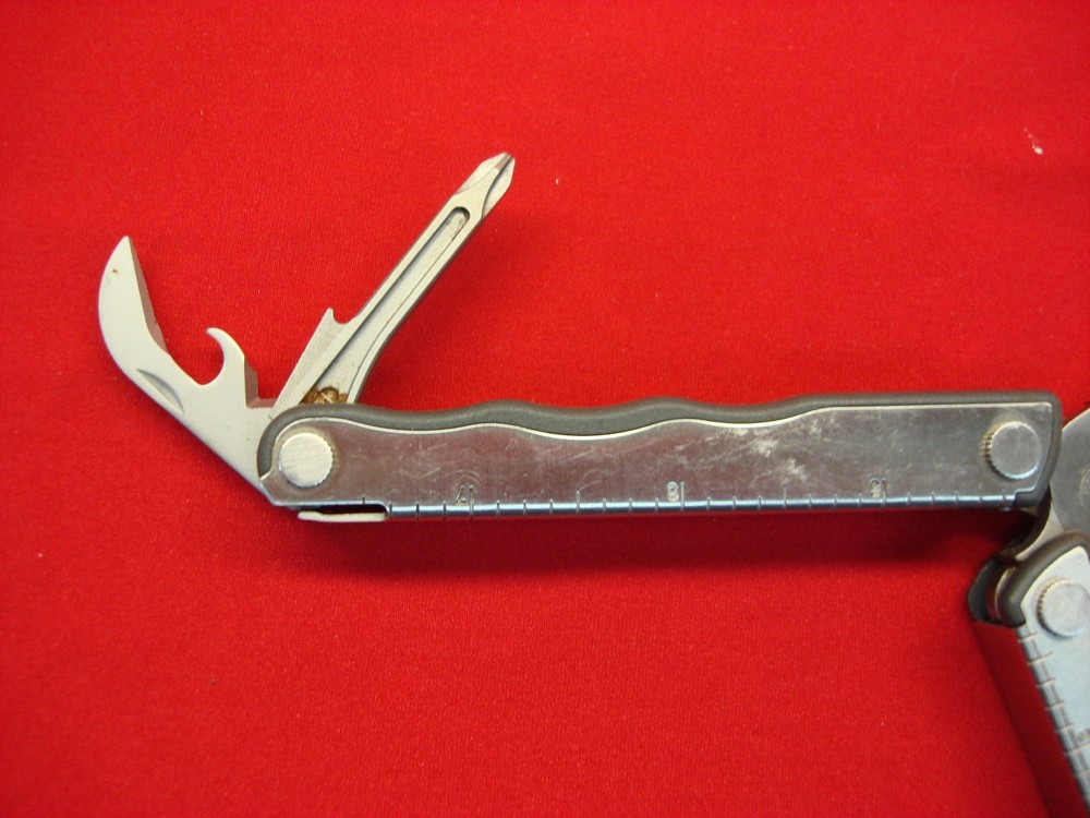 LEATHERMAN KICK MULTI-TOOL - GENUINE WITH 5 TOOLS - PREOWNED BUT VERY NICE COND.