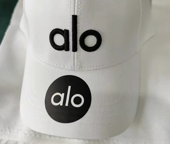 White Athletic Performance Cap Black Logo Adjustable Unisex Hat