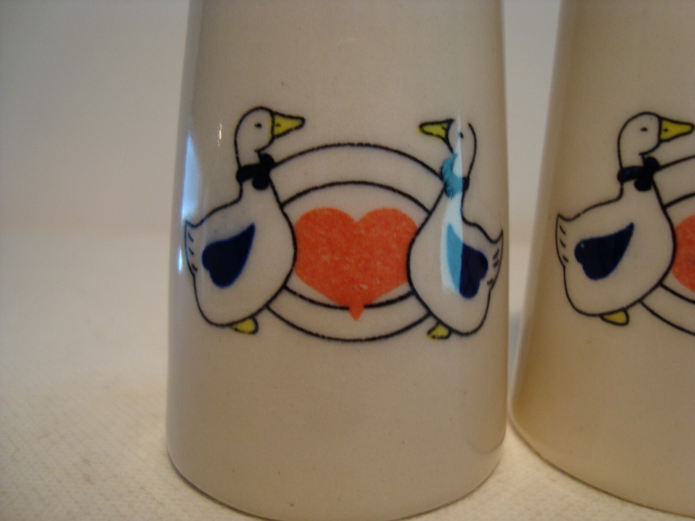 Cone shape white porcelain salt & pepper set.