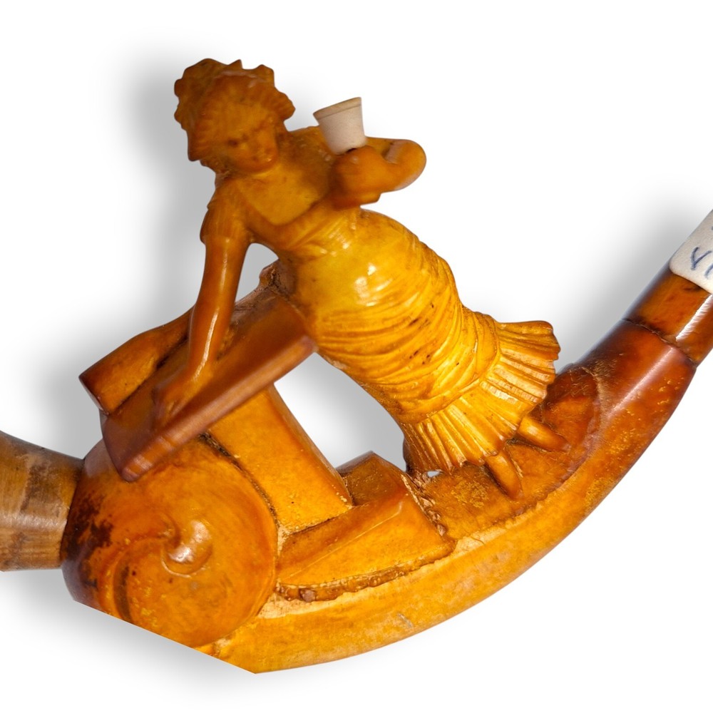 Antique pipe meerschaum lady with a table drinking