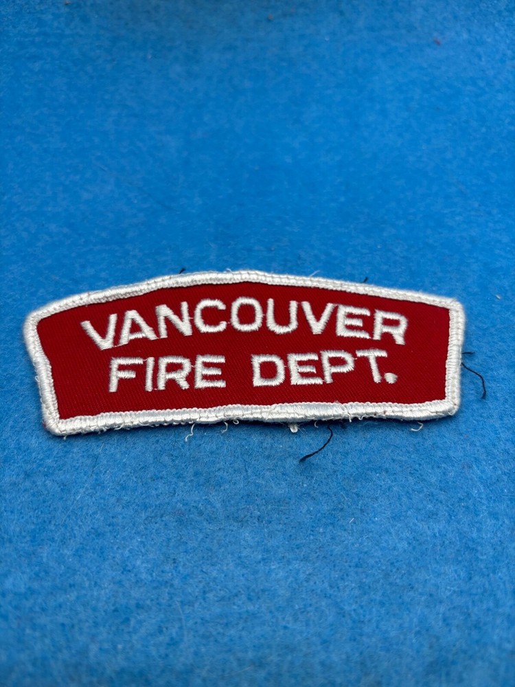 Shoulder  Vancouver white lettering on red