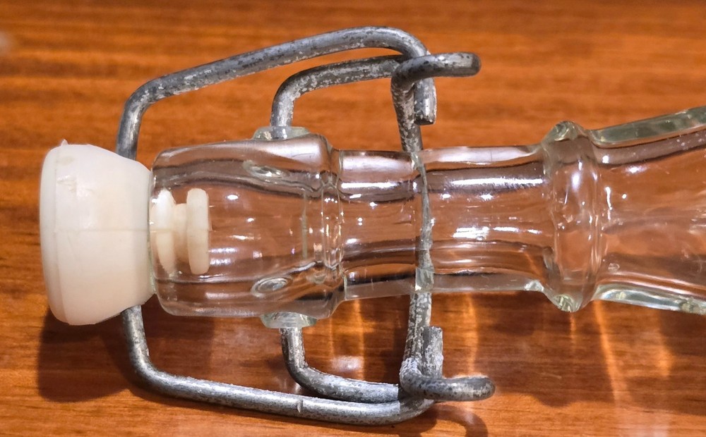Vintage unusual glass, triangular bottle w/bail & stopper closure