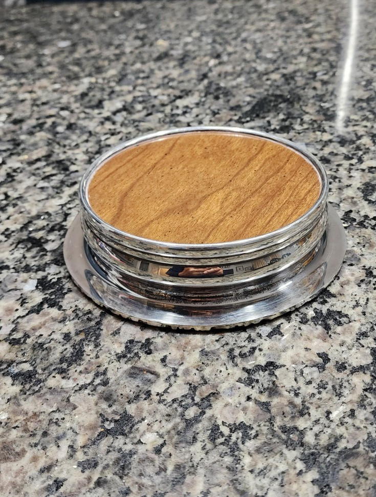 Vintage English silver plated wine coaster