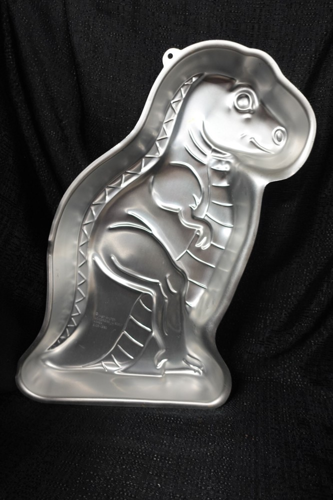 Wilton Partysaurus cake pan / 2105-1280 / decoration sheet