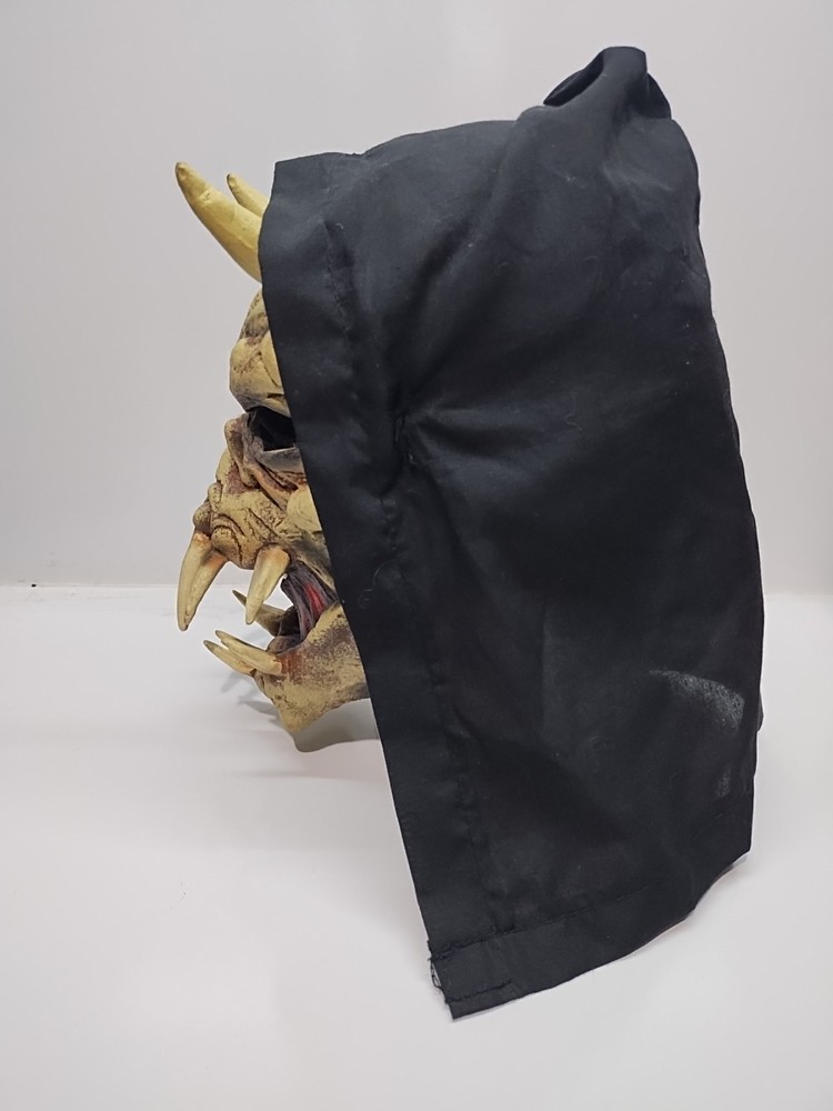 horned fanged demon by paper magic group