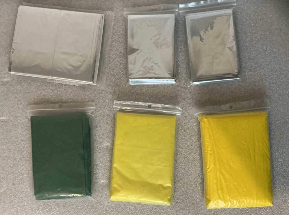 Bundle lot of assorted rain poncho and emergency blanket