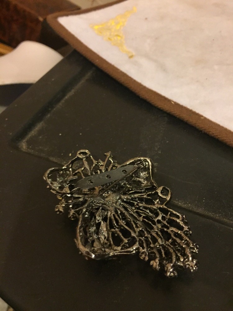 Black Metal And Crystal Brooch