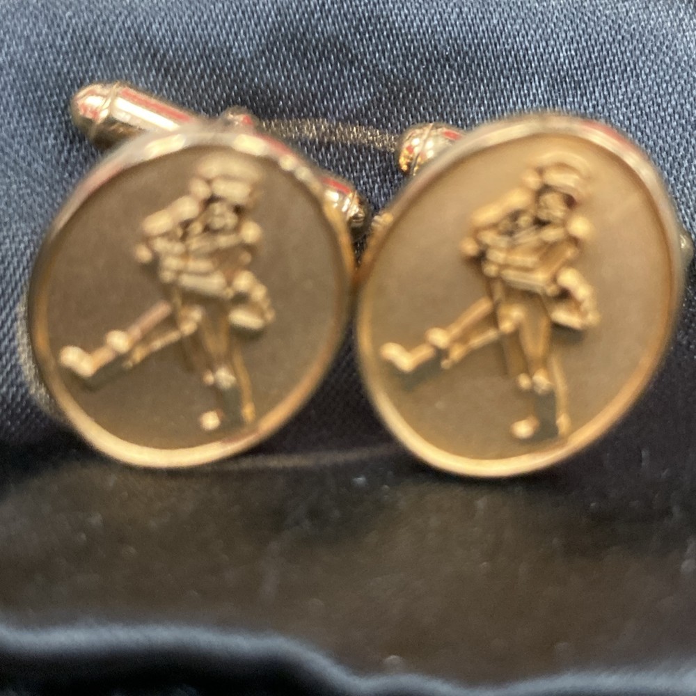 Gold tone cuff-links walking man