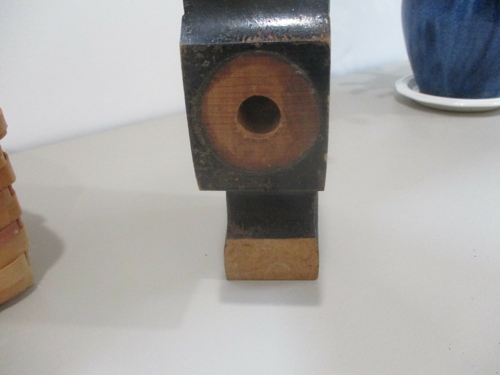 Antique painted black corbel.