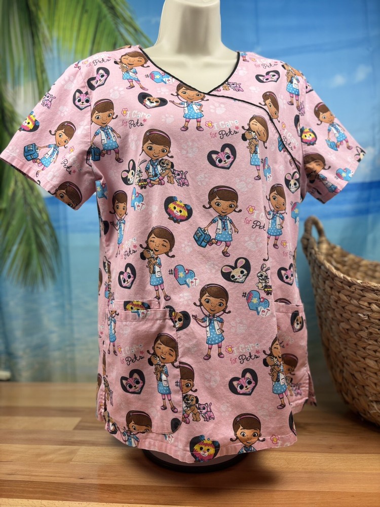 Women’s Disney Doc McStuffins Pink Scrub Top Size Medium