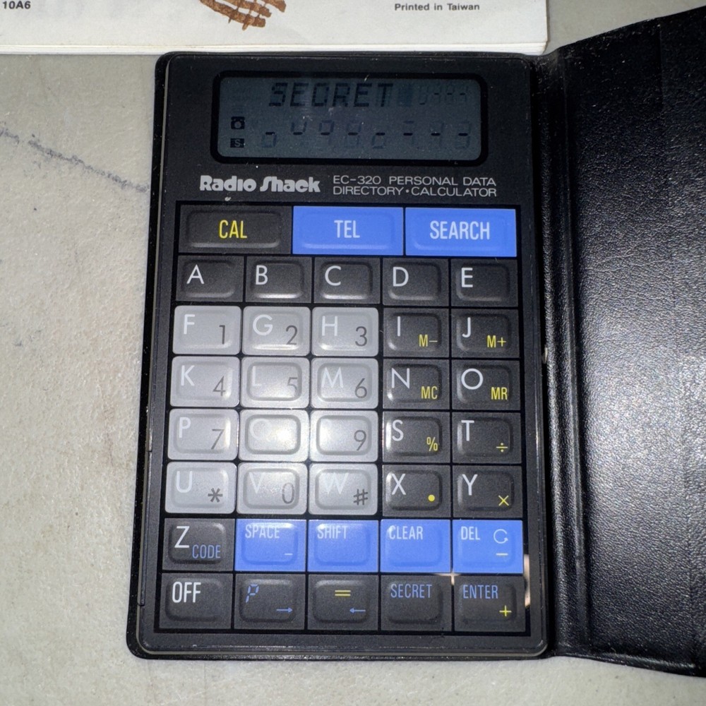 RadioShack Mity Thin Calculator & Directory EC-320 Works Great!