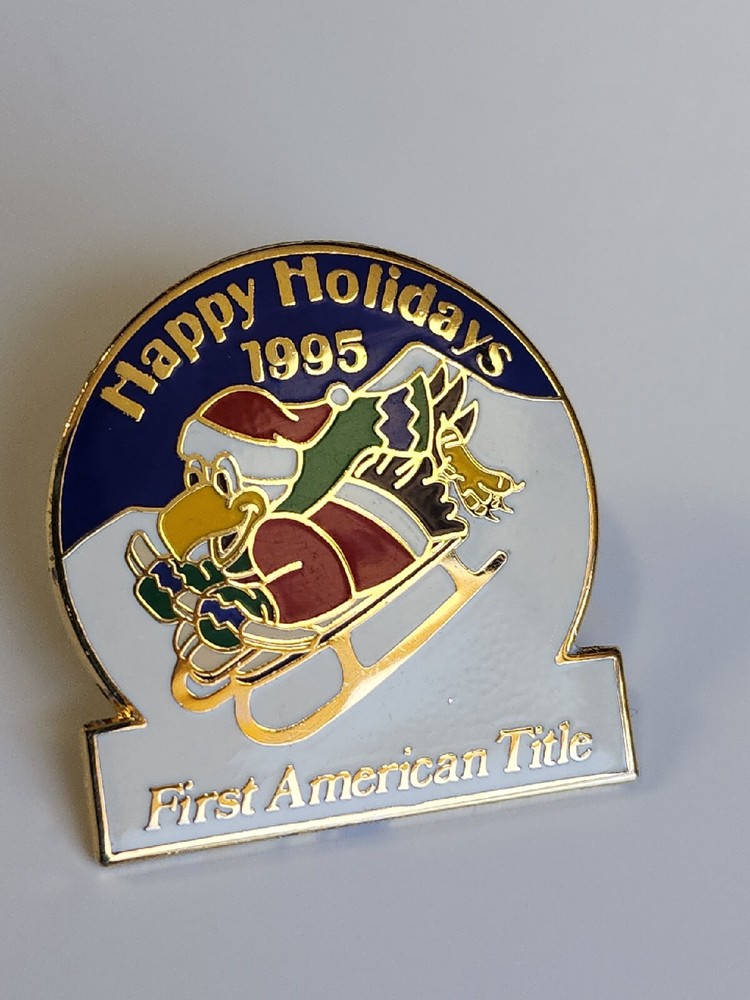 First American Title Lapel Pin Happy Holidays 1995 Eagle Sledding
