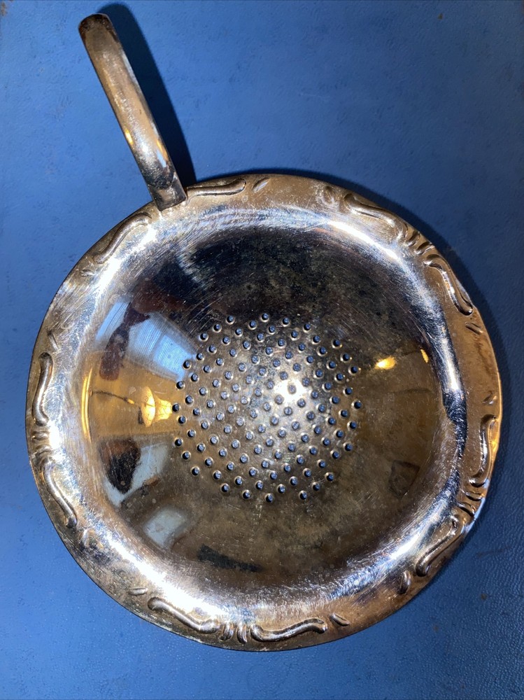 vintage tea strainer antique