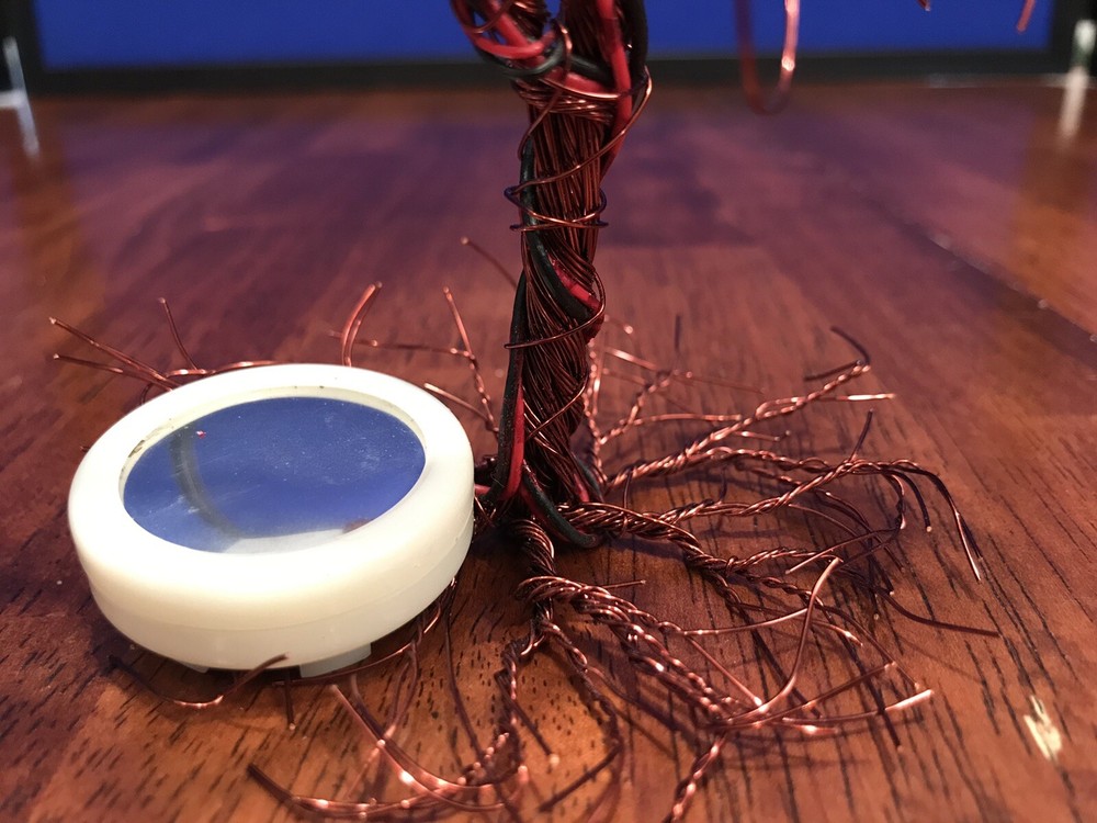 Twisted Red Wire Christmas Tree Plays Music