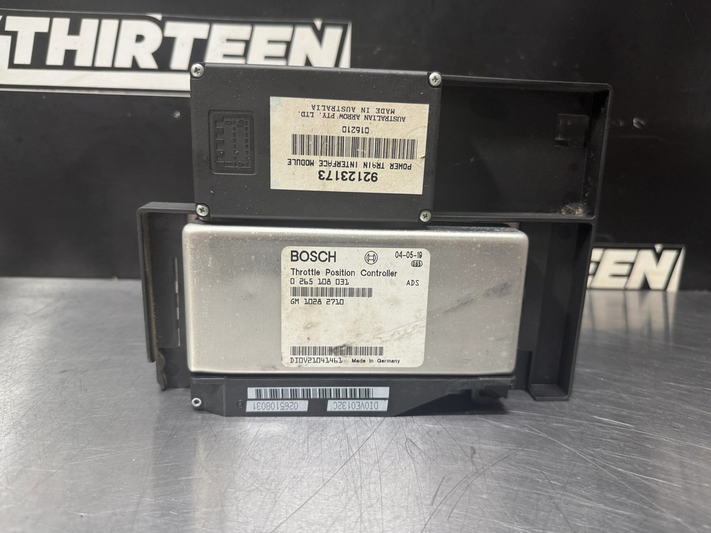 04-06 PONTIAC GTO THROTTLE POSITION CONTROLLER AND POWER TRAIN MODULE # L386