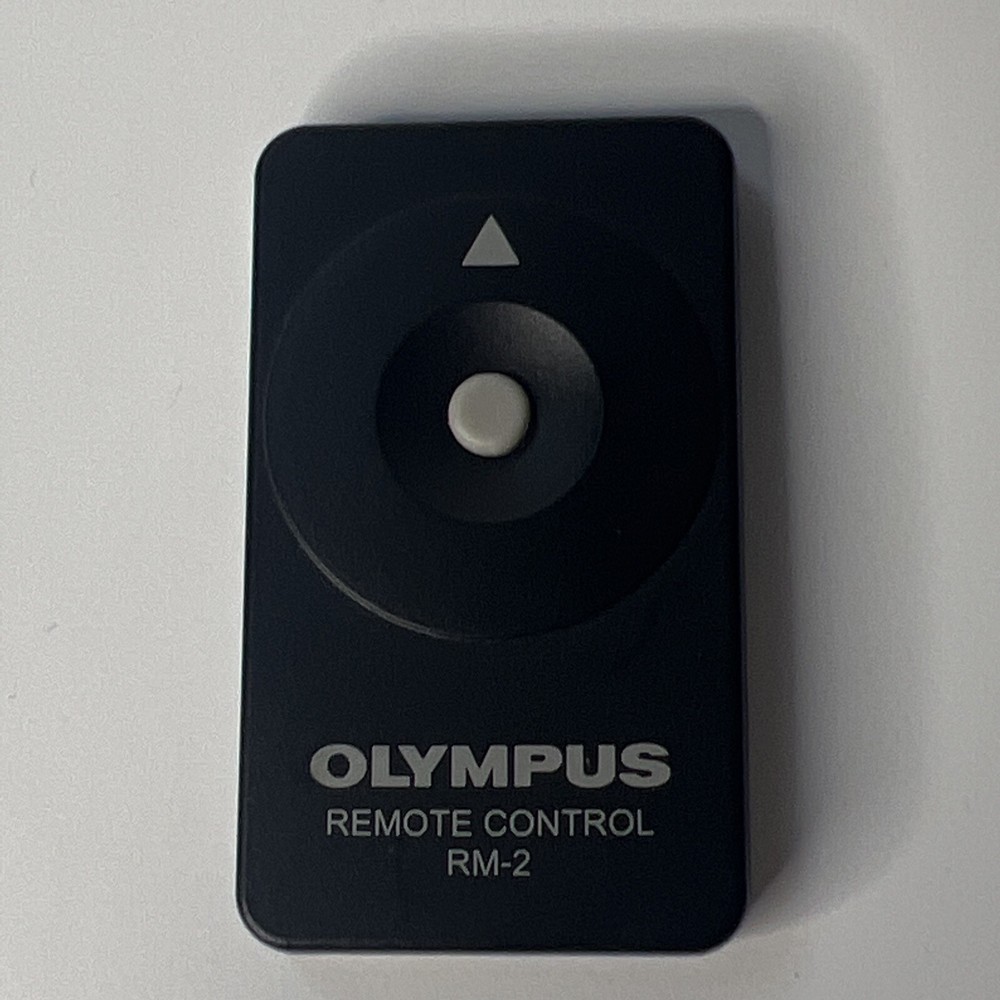Olympus RM-2 Remote Control NEEDS BATTERY Used
