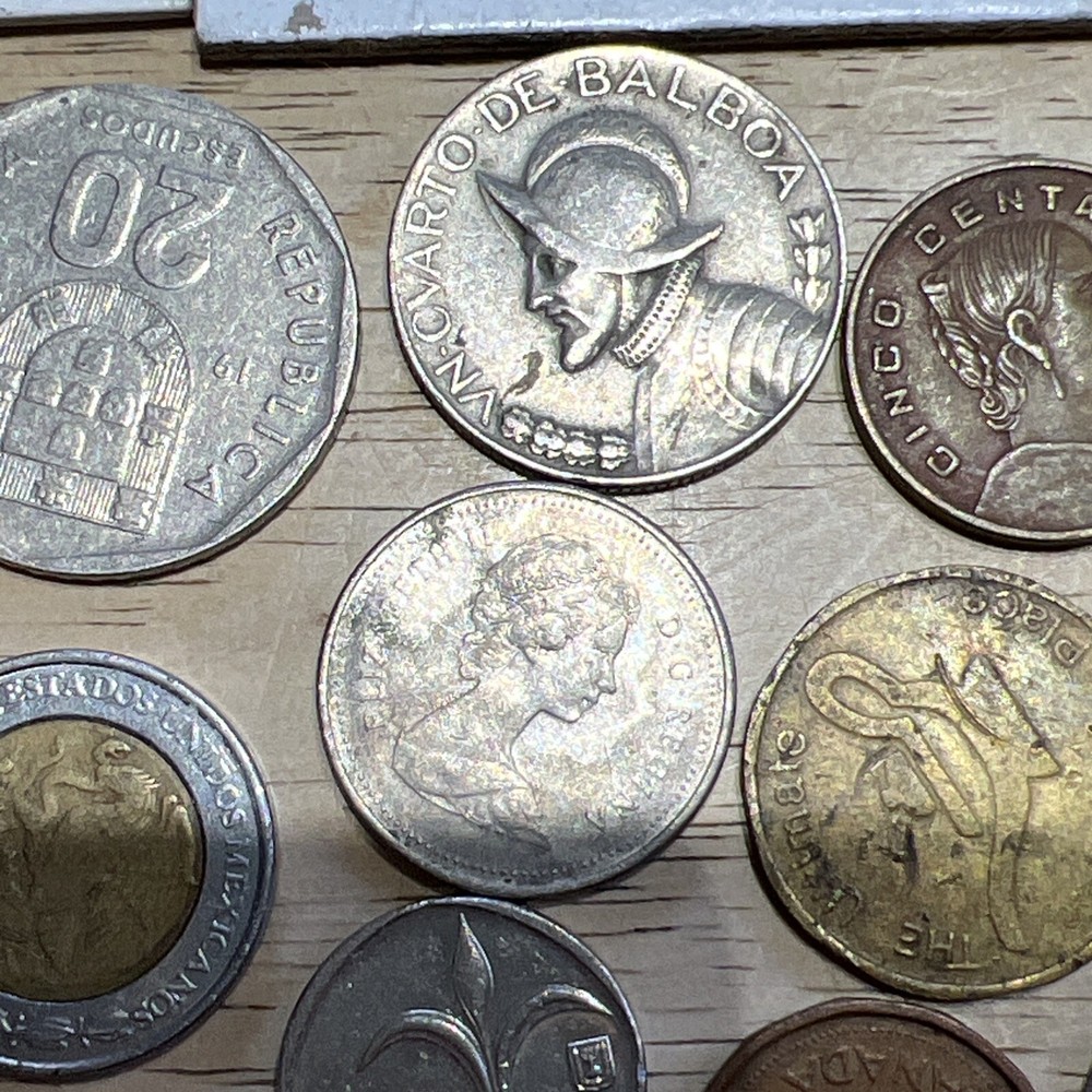 Assorted foreign and American Coins Lot. 27 Total