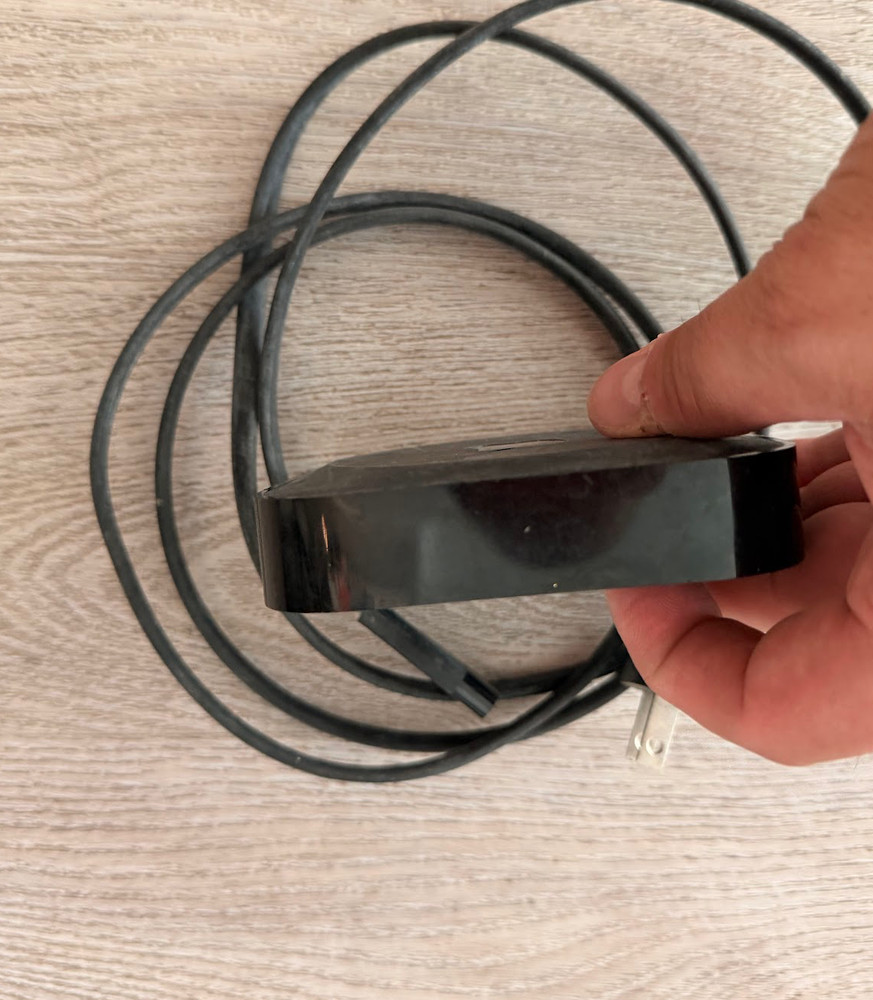 Apple TV Black MODEL A1469 with power cable.