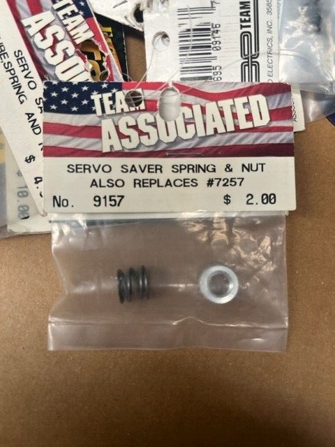 Team Associated BUNDLE (2249-pivot ball socket caps) & (9157- servo saver)