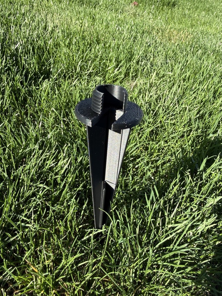 Universal landscape lighting stake