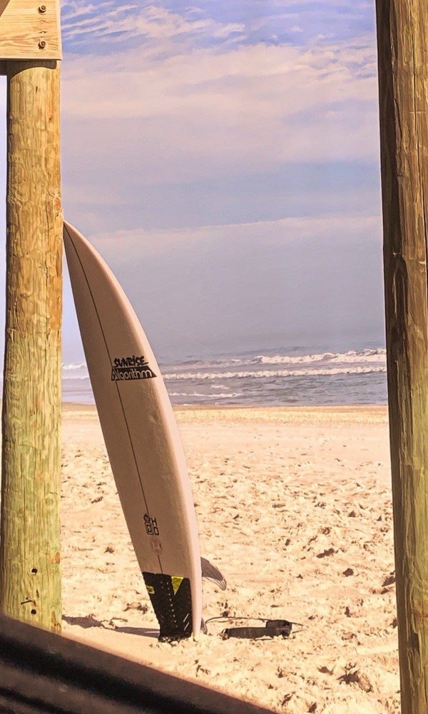 5’8 algorithm surfboard. Has a few dents but is still in great condition.