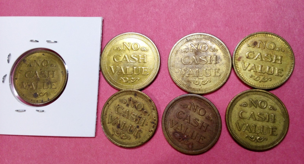 Discovery Zone-tokens (7) Tokens- 2 Sizes