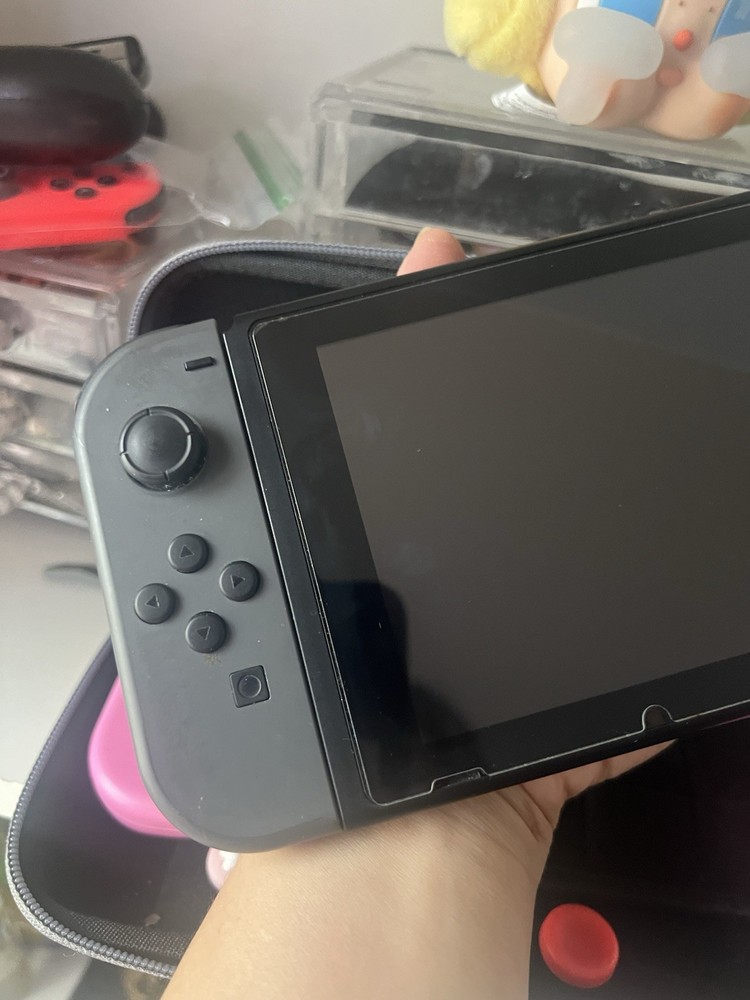 Nintendo Switch Console w/ Joy-Con, Grip, tomtoc Case, Thumb Grips