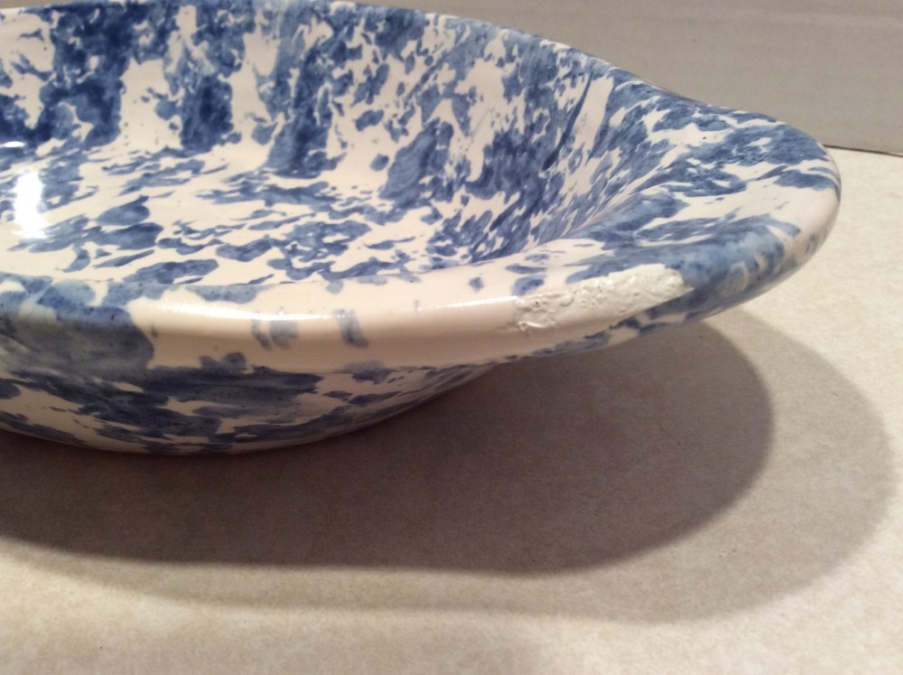 Oval blue spackled pottery dish, handcrafted