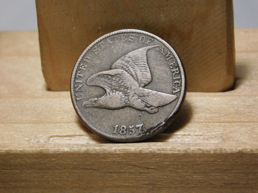 1857 U.S. Flying Eagle cent, lamination error at edge