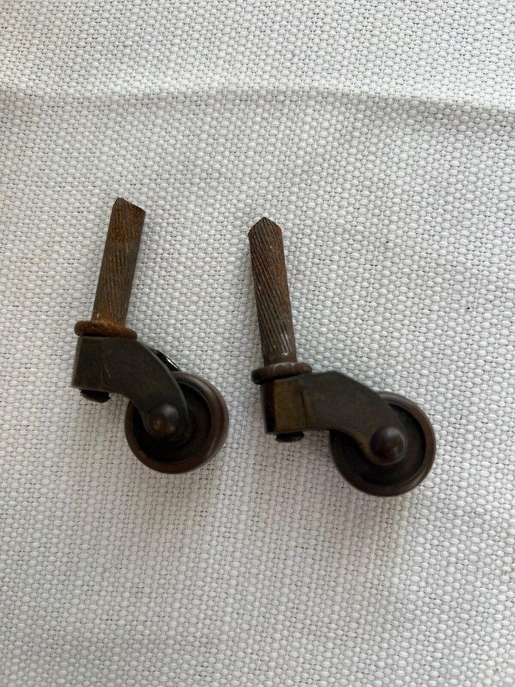 Two Antique Metal Casters
