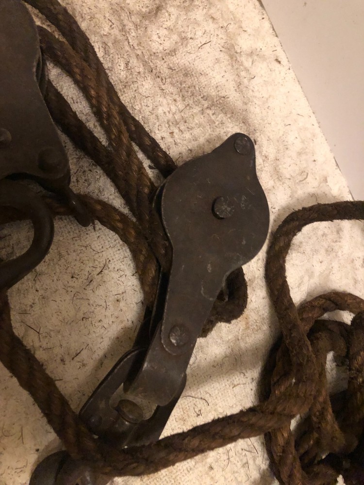 Antique primitive rope and chain hoist