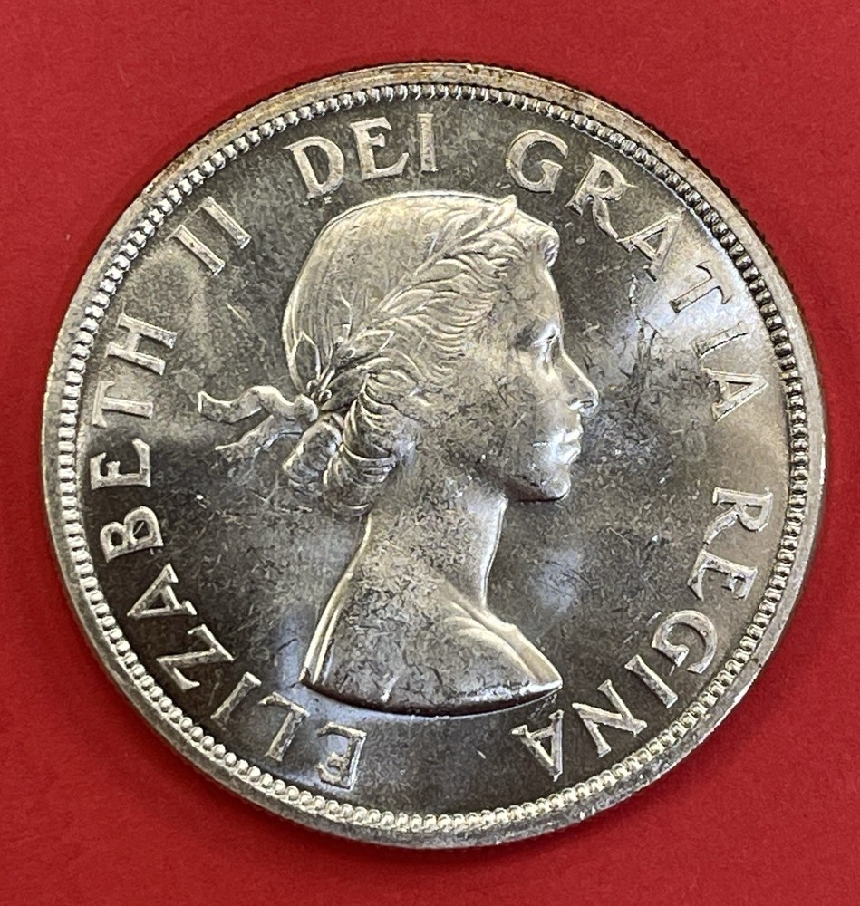 1957 Canada Silver Dollar, Uncirculated. Beautiful Dollar.