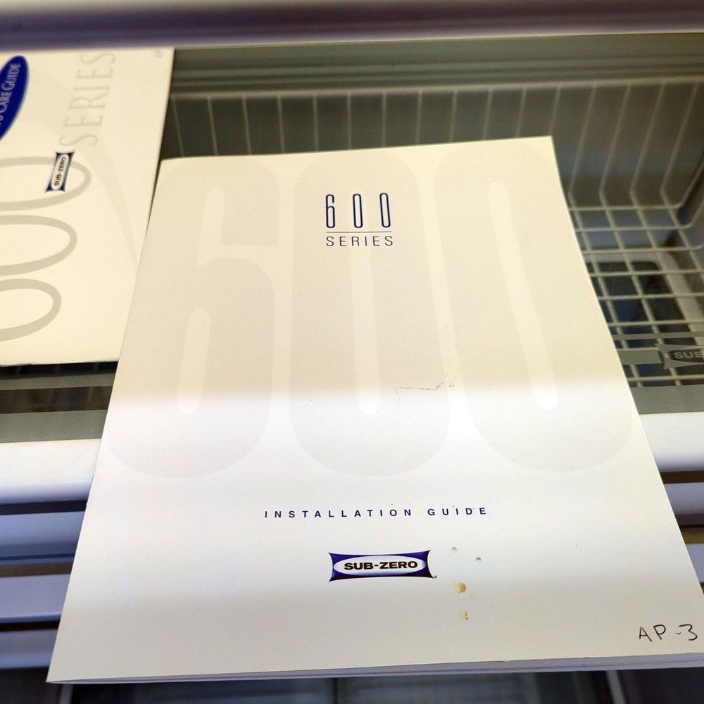 Sub-Zero Stainless Steel Side-by-Side Refrigerator with Ice Dispenser