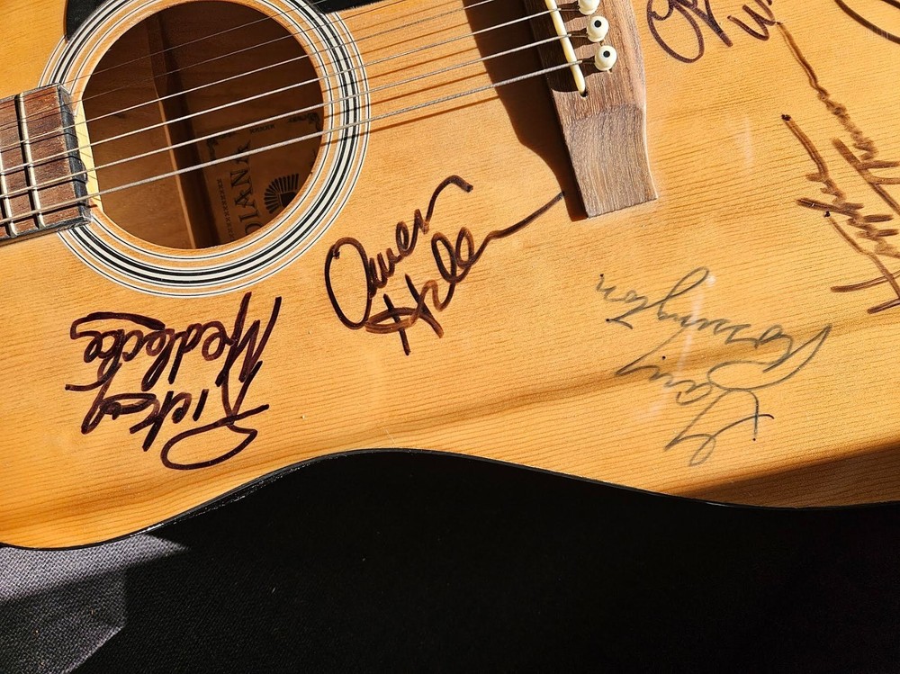 LYNYRD SKYNYRD SIGNED ACOUSTICAL GUITAR