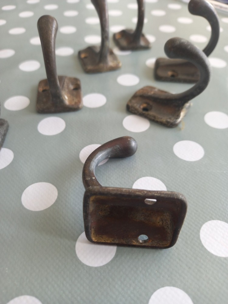 Reclaimed brass coat hooks
