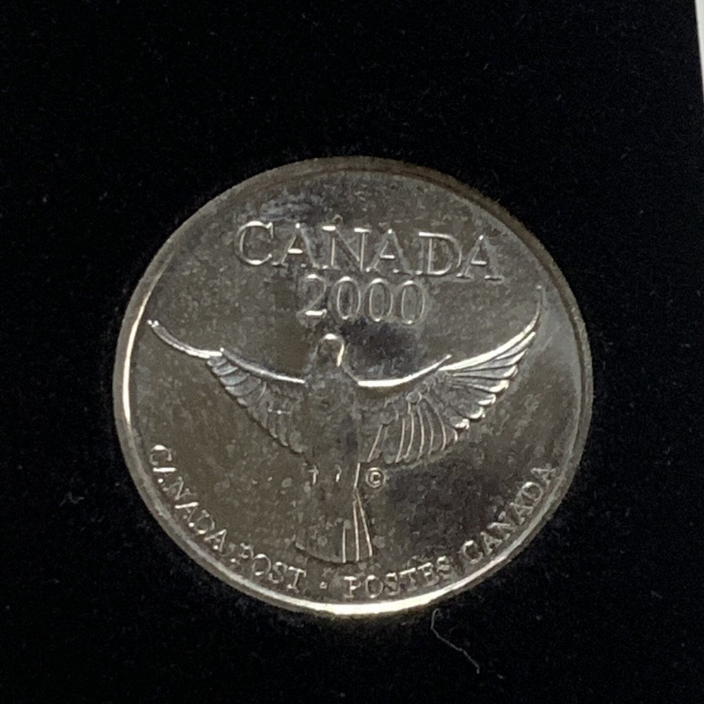 1999 2000 CANADA MILLENNIUM KEEPSAKE COIN AND MINT STAMPS SET IN TIN BOX