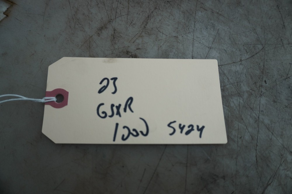 HAS SMALL DENT IN OUTER LIP SEE PICS