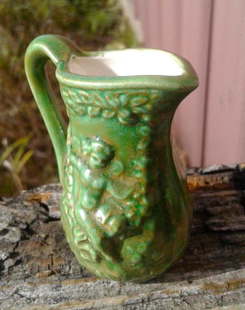 Vintage Miniature Green Pitcher with Embossed Cherubs