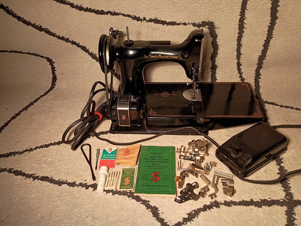 1952 singer featherweight sewing machine.