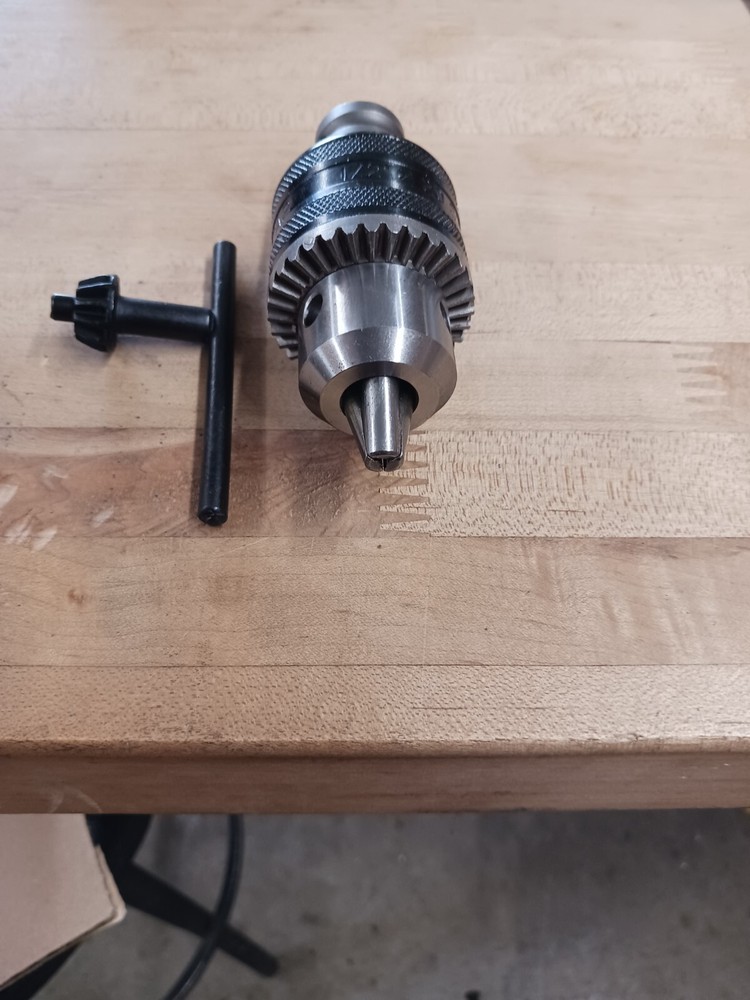 1/2 jacobs chuck with 1/2" square adapter comes with key