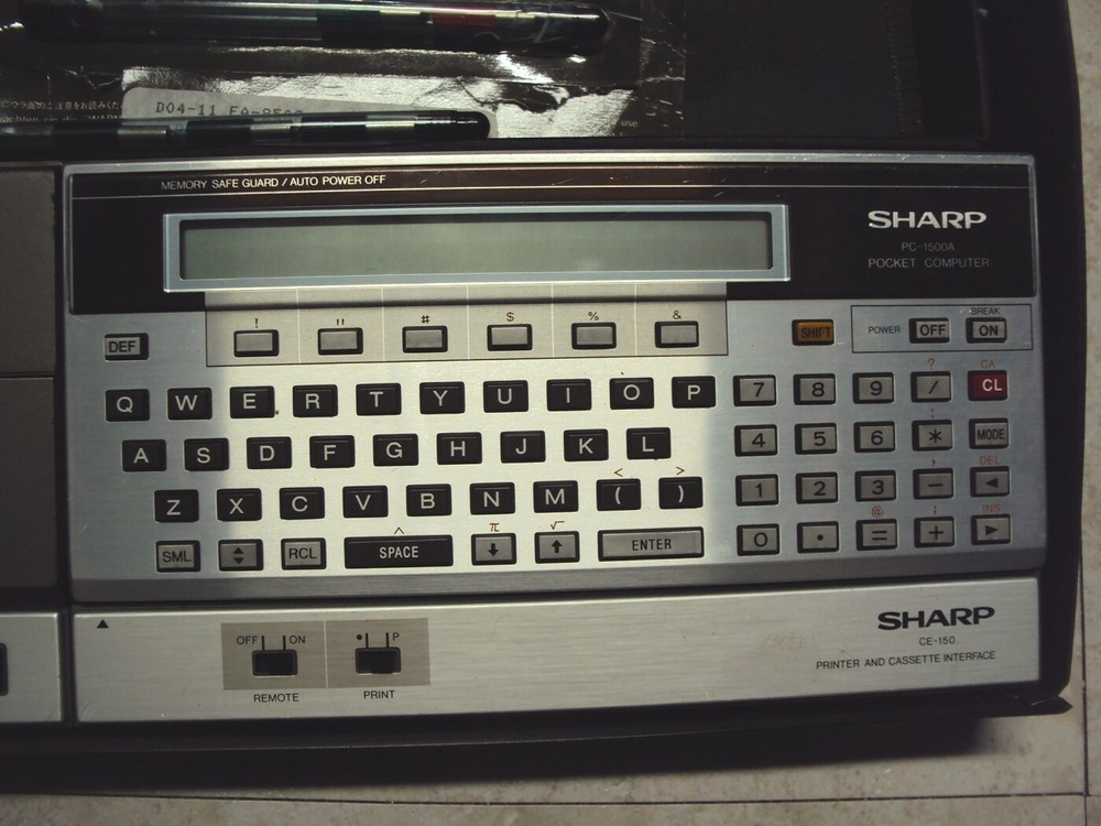 Sharp Portable Microcomputer and Printer, The PC-1500A powers up OK, very Clean!